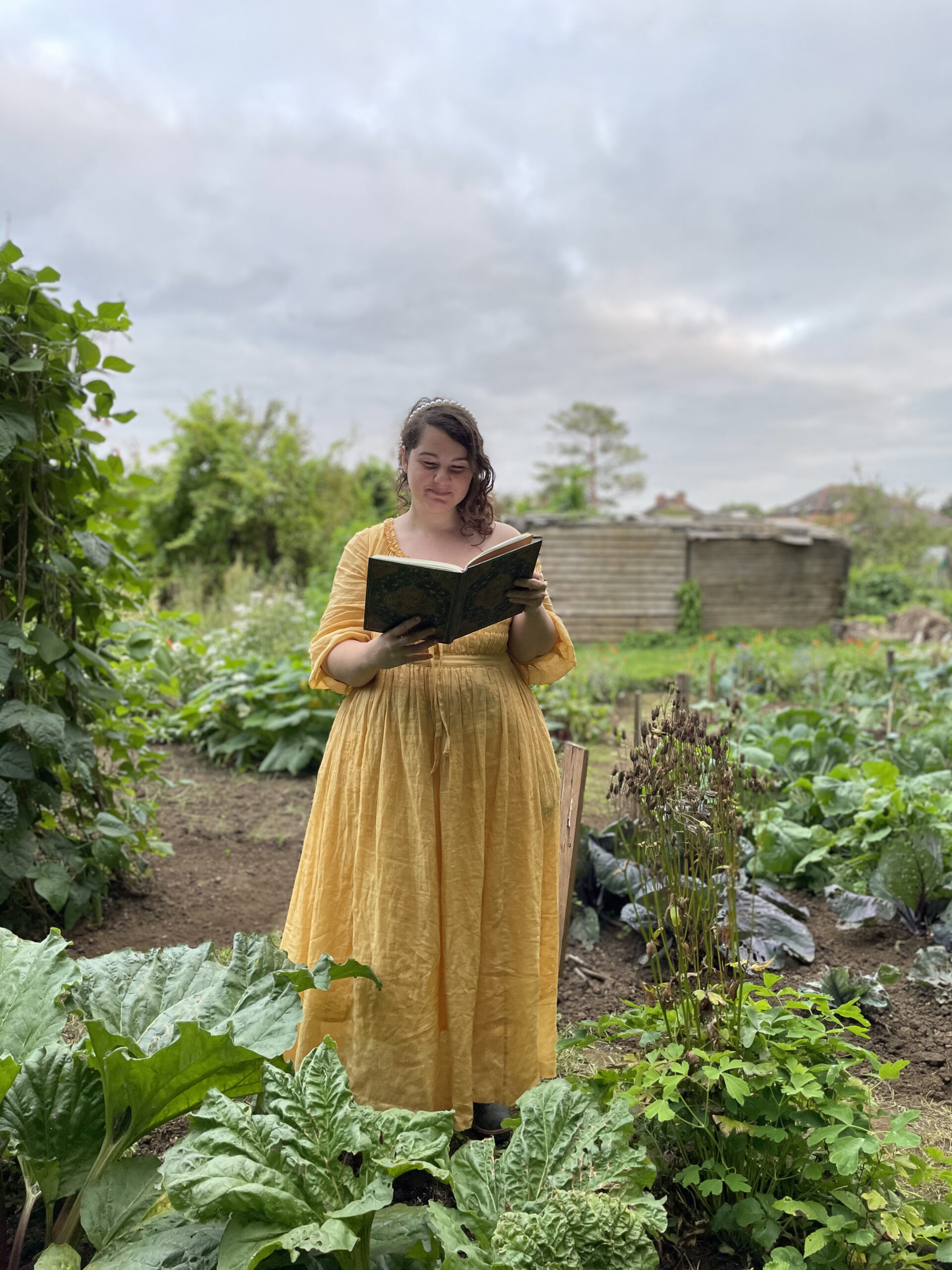 Laura Theis reading at the 1918 Allotment
